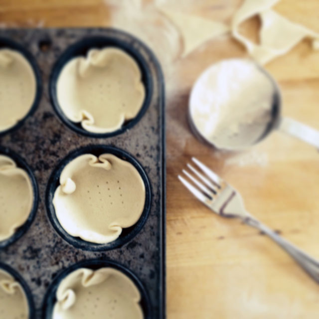 Docking pastry for Portuguese Custard Tarts by TheMessyBaker.com