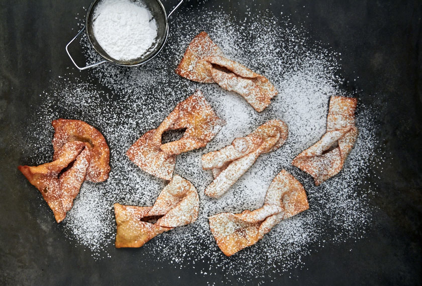 Crostoli dusted with icing sugar by The Messy Baker