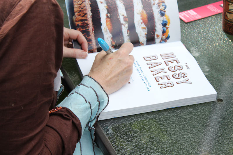 Charmian Christie signs copies at The Messy Baker Book Launch.