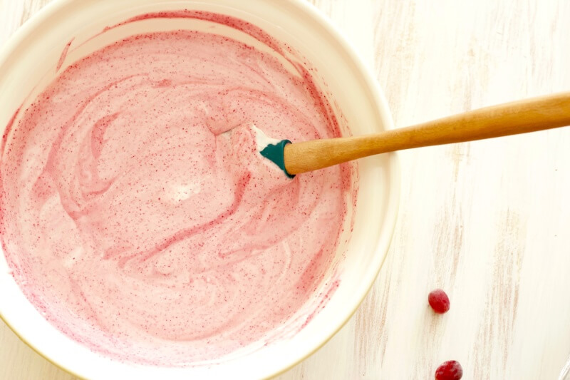 Mixing up no-churn cranberry ice cream by The Messy Baker