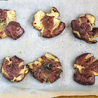 Smashed Potatoes turn leftover baked potatoes into something special. Ugly, but special. - TheMessyBaker.com